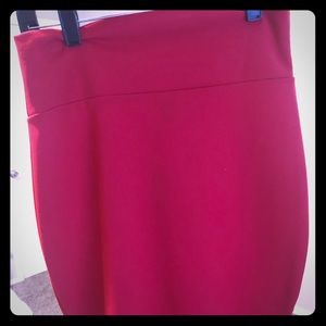 Fitted knee length red skirt